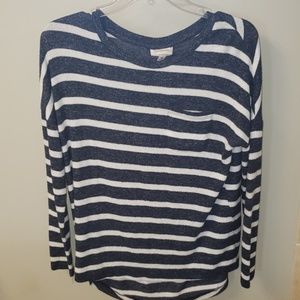 Long sleeved blue and white striped shirt